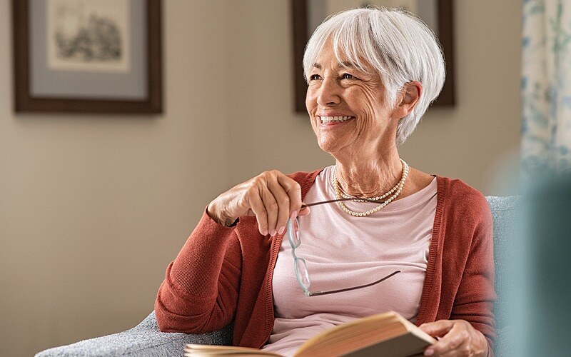 bigstock-Senior-woman-holding-eyeglasse-421235963-1